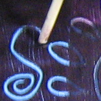 scrape off design on cloth
